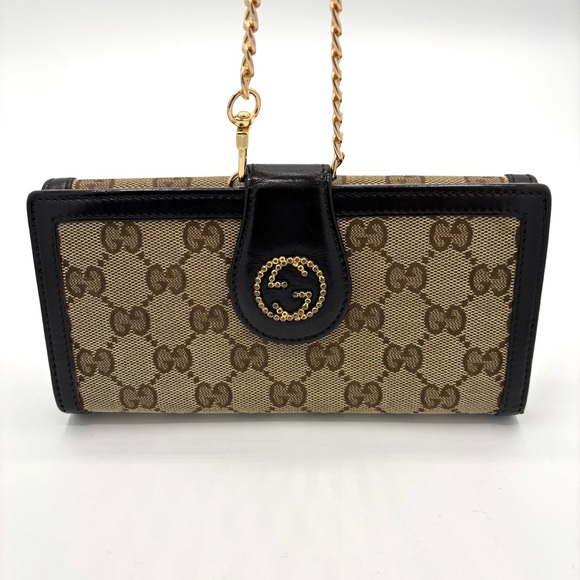 Gucci Handbags - Gucci Brown and‎ Black Clutch with Iconic Monogram